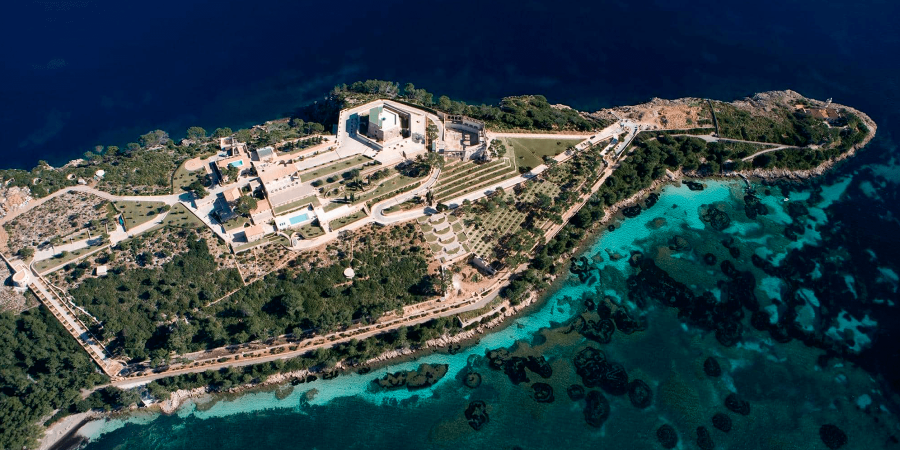 Aerial view of a coastal finca and the Mallorca shoreline